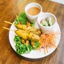 Chicken Satay skewers with peanut sauce and cucumber salad