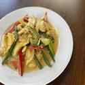 Golden Noodles in red-yellow curry sauce with vegetables