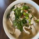 Noodle Soup with wide rice noodle in hot broth